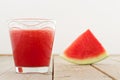 Fresh watermelon blending in glass on wood table Royalty Free Stock Photo