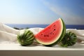 Fresh watermelon centerpiece on a white desk with ample free space