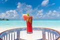 Fresh watermelon juice with mint on the glass table ocean background at the beach Royalty Free Stock Photo