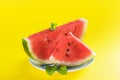 Fresh watermelon on light yellow background. Watermelon slices on a plate. Healthy Summer Snack Concept, copy space Royalty Free Stock Photo