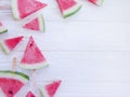 Fresh watermelon organic pieces frame on a wooden background Royalty Free Stock Photo