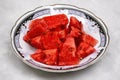 Fresh watermelon slice on a plate on white background Royalty Free Stock Photo