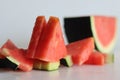 Fresh watermelon slices in different shapes. Wedge shape and triangle shape Royalty Free Stock Photo