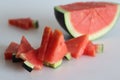 Fresh watermelon slices in different shapes. Wedge shape and triangle shape Royalty Free Stock Photo
