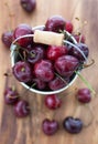 Fresh wet cherries in a bucket Royalty Free Stock Photo