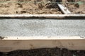 Fresh wet concrete inside timbering