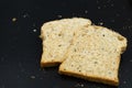 Fresh wheat bread slice isolated on black background Royalty Free Stock Photo