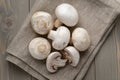 Fresh white champignon on wood table Royalty Free Stock Photo