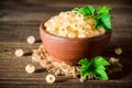 Fresh white currant in ceramic bowl on dark wooden background. Royalty Free Stock Photo