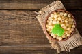 Fresh white currant in ceramic bowl on dark wooden background. Royalty Free Stock Photo