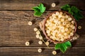 Fresh white currant in ceramic bowl on dark wooden background. Royalty Free Stock Photo