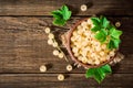 Fresh white currant in ceramic bowl on dark wooden background. Royalty Free Stock Photo