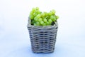 Fresh white grapes in a small basket Royalty Free Stock Photo