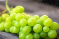 Fresh white grapes on wood