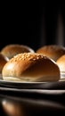 Fresh white hamburger buns with shiny tops