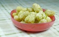 Fresh white mulberry bowl on tablecloth