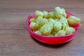 Fresh white mulberry bowl on wood table