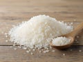 White Rice Grains on a Rustic Wooden Surface Royalty Free Stock Photo