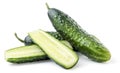 Fresh whole cucumber and half on a white background. Isolated Royalty Free Stock Photo
