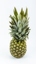 Fresh whole and cut pineapple isolated on white background. From top view Royalty Free Stock Photo