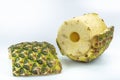 Fresh whole and cut pineapple isolated on white background. From top view Royalty Free Stock Photo