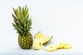 Fresh whole and cut pineapple isolated on white background. From top view Royalty Free Stock Photo