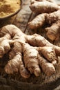 Fresh whole ginger root with ground powder Royalty Free Stock Photo