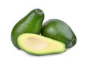 Fresh whole and half avocado isolated on white Royalty Free Stock Photo