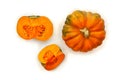 Fresh whole, half and sliced nutmeg pumpkins on a white background with space for text. Top view, flat lay Royalty Free Stock Photo