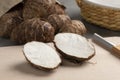 Fresh whole and halved taro vegetable Royalty Free Stock Photo