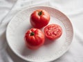 fresh whole and halved tomatoes Royalty Free Stock Photo