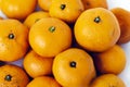 Fresh whole mandarin oranges background , top view