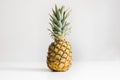 Fresh whole pineapple on a white background Royalty Free Stock Photo