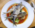 Fresh whole sardines for lunch in a sweet chilli sauce Royalty Free Stock Photo