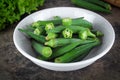 Fresh whole and slice organic green okra