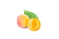 Fresh whole sweet apricot fruit with leaf and half, ripe fruits, isolated apricots, element for package design, on white Royalty Free Stock Photo