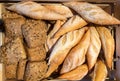 Fresh Whole Wheat Bread in Wooden Basket Background Texture, Top View Royalty Free Stock Photo