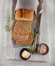 Fresh wholegrain bread on white wooden kitchen table Royalty Free Stock Photo