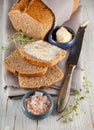 Fresh wholegrain bread on white wooden kitchen table Royalty Free Stock Photo