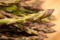 Fresh wild asparagus on a wooden table ready to be cooked Royalty Free Stock Photo