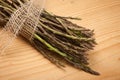 Fresh wild asparagus on a wooden table Royalty Free Stock Photo