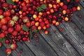 Fresh wild berries on wooden background, top view Royalty Free Stock Photo