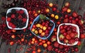 Fresh wild berries on wooden background, top view Royalty Free Stock Photo