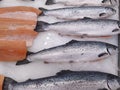 Fresh wild caught King Salmon on ice in a local sea food market Royalty Free Stock Photo