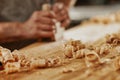 Fresh wood shavings and sawdust on a workbench Royalty Free Stock Photo