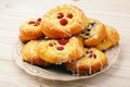 Fresh yeast buns with cheese and berries. Royalty Free Stock Photo