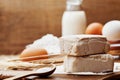 Fresh yeast and ingredients for Easter baking on rustic kitchen table. Royalty Free Stock Photo