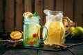 Fresh yellow banana sweet lemonade in glass jars