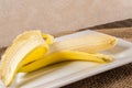 Fresh yellow bananas,wood,table,burlap cloth Royalty Free Stock Photo