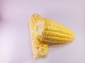 Fresh yellow corn photo closeup isolates by white bckground Royalty Free Stock Photo